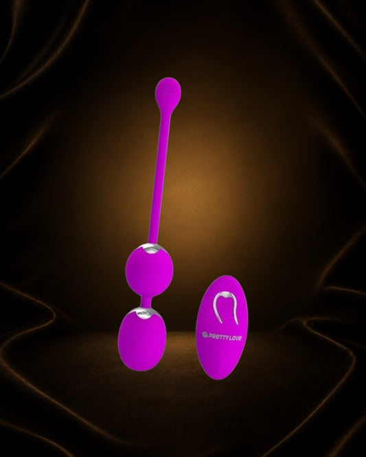 Bolas Kegel moradas de silicona recargables de Éxtasis Boutique con control remoto y 12 funciones de vibración.