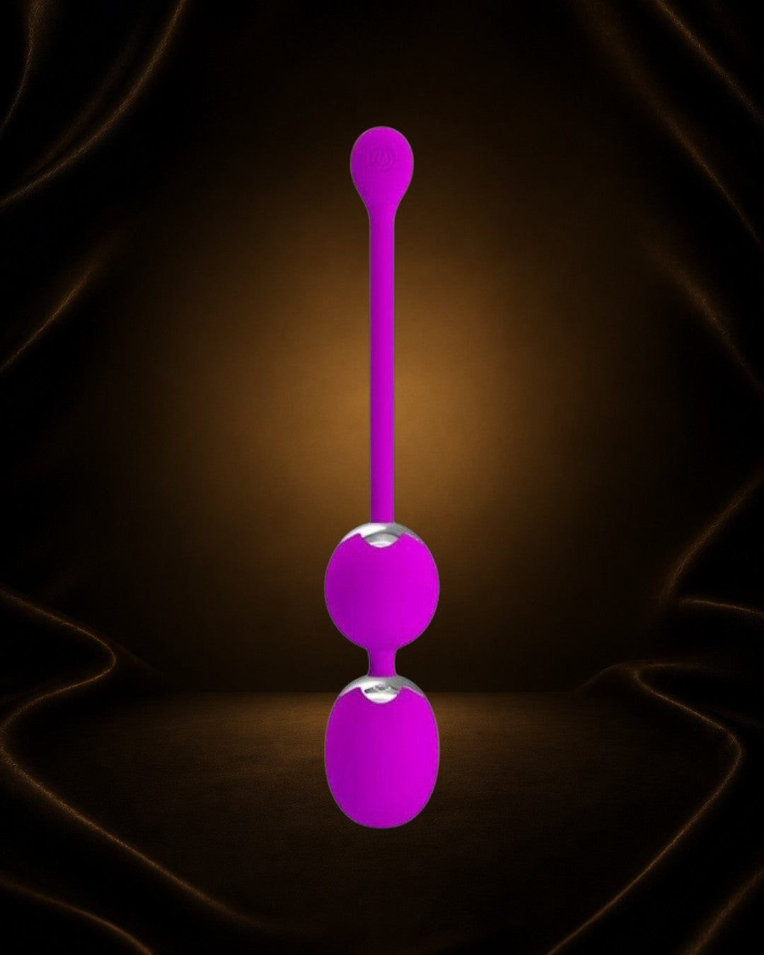 Bolas Kegel con vibración Éxtasis Boutique en color morado, de silicona, con dos esferas y un extremo con forma de lágrima.
