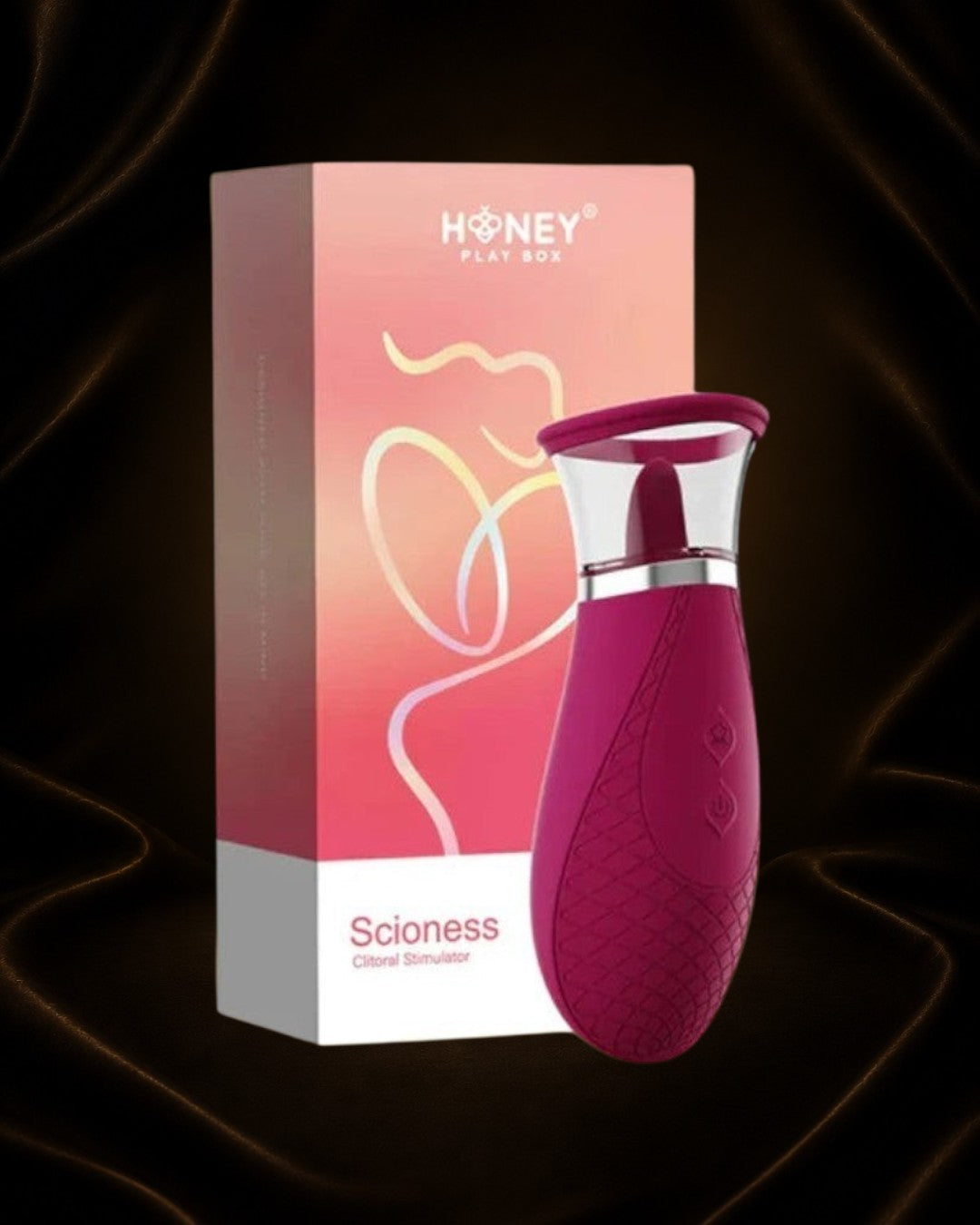 Succionador y estimulador clitoriano Scioness de Éxtasis Boutique en color fucsia con detalles texturizados y caja a juego.