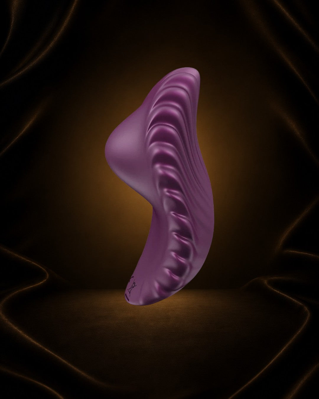 Vibrador de bragas Éxtasis Boutique Pearl de silicona morada con acabado perlado y vibraciones potentes.