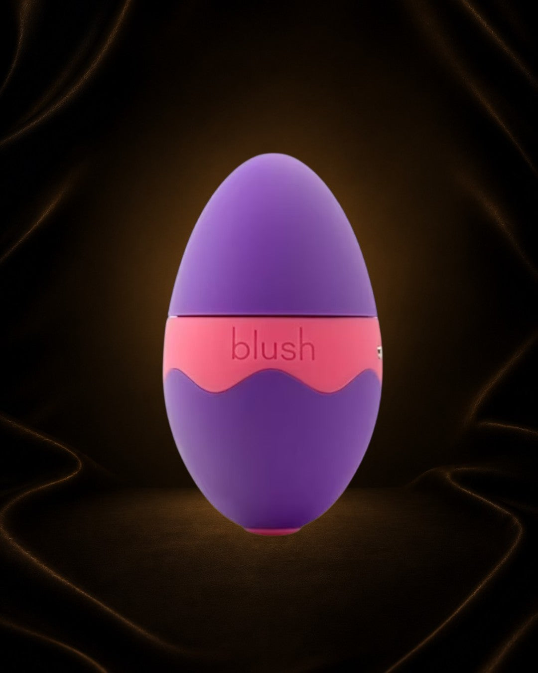 Éxtasis Boutique Aria Flutter Tongue vibrador morado y rosa de silicona con forma de huevo, recargable y sumergible.