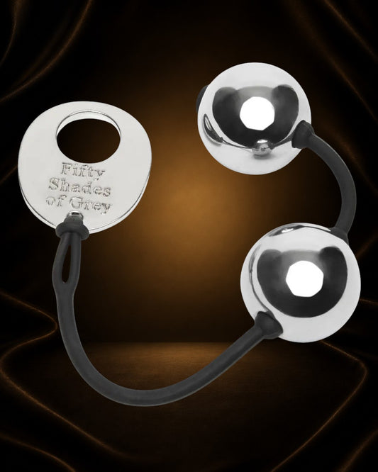 Bolas Kegel metálicas premium Inner Goddess de Éxtasis Boutique, plateadas, con disco de acero inoxidable grabado.