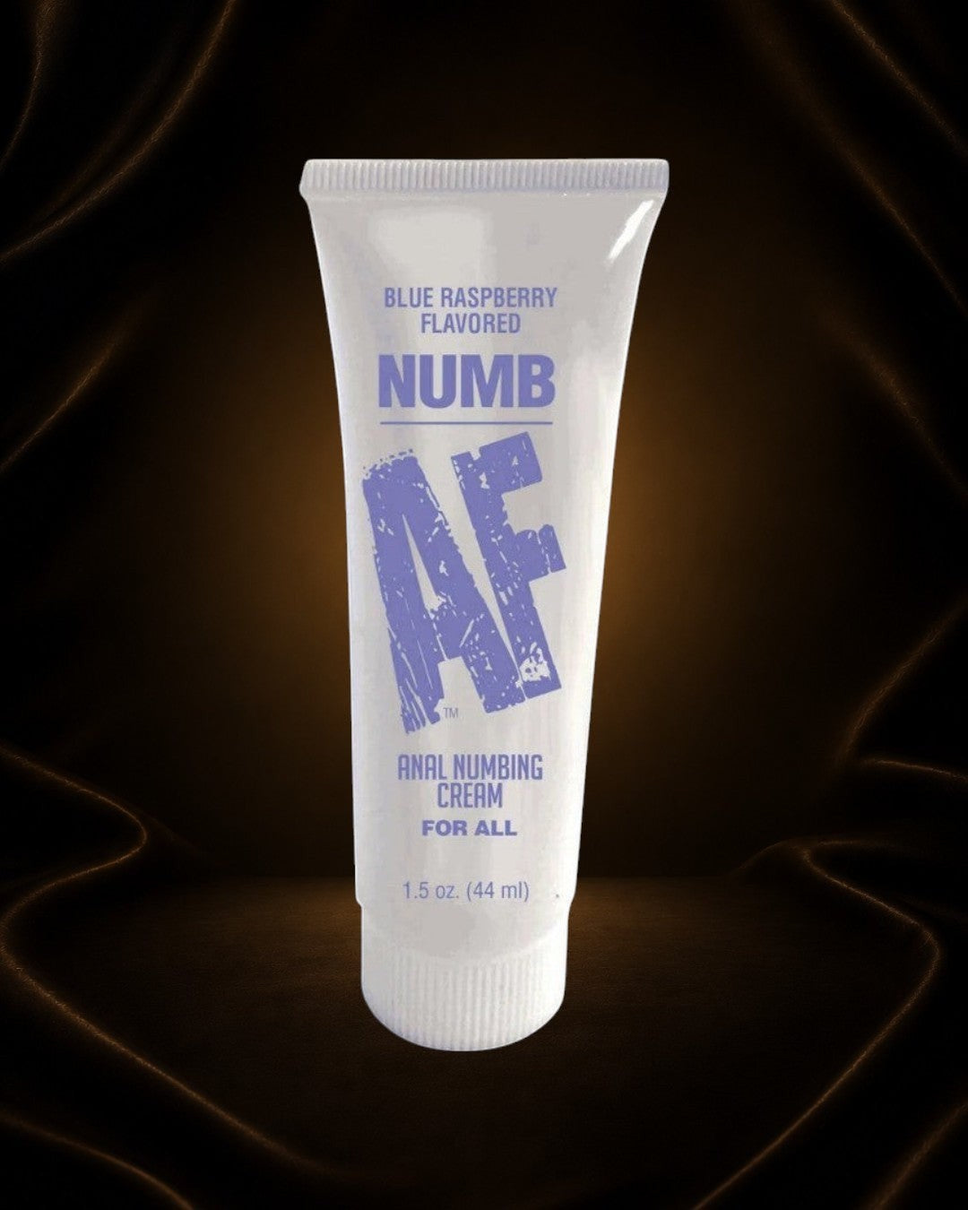 Éxtasis Boutique Crema Anestésica Anal sabor frambuesa azul, tubo y caja.