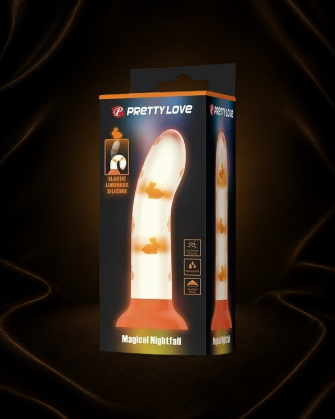 Éxtasis Boutique Dildo Neón de silicona luminosa con estampado de conejos y base de succión, color blanco y naranja.