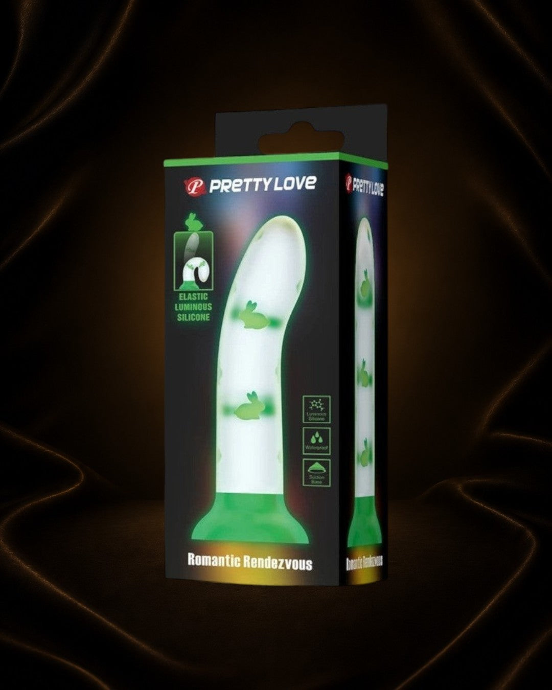 Éxtasis Boutique Dildo Neón de silicona luminosa con diseño de conejos y base de succión, ideal para experiencias sensoriales.