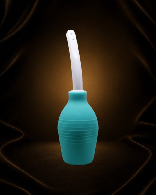 Éxtasis Boutique Enema Pretty Love, sistema de limpieza de caucho y plástico ABS en color turquesa y blanco.