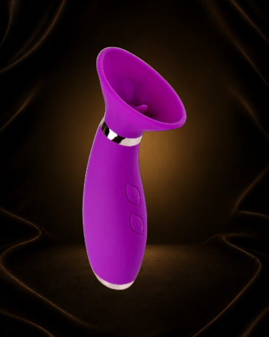 Estimulador succionador y vibrador Seduction morado de Éxtasis Boutique con lengua flexible y succión para estimulación clitoriana.