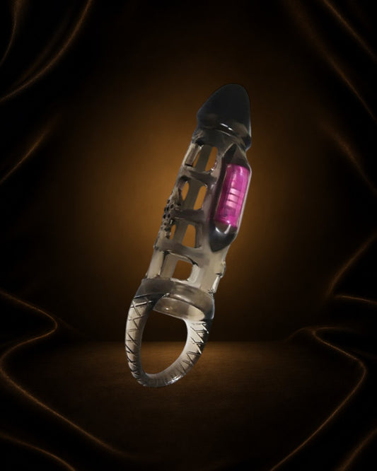Extensor Harrison 7" de Éxtasis Boutique en TPR transparente con detalles en rosa y negro. Diseño ergonómico con textura.