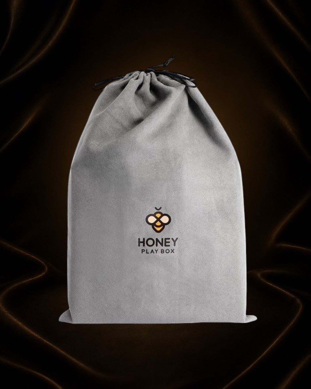Bolsa de almacenamiento gris de Éxtasis Boutique para el dildo Idalis Honey de 8" de silicona.