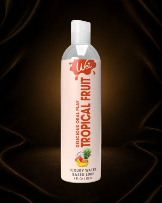 Éxtasis Boutique Lubricante oral a base de agua con sabor a fruta tropical, 118 ml. Fórmula no pegajosa.