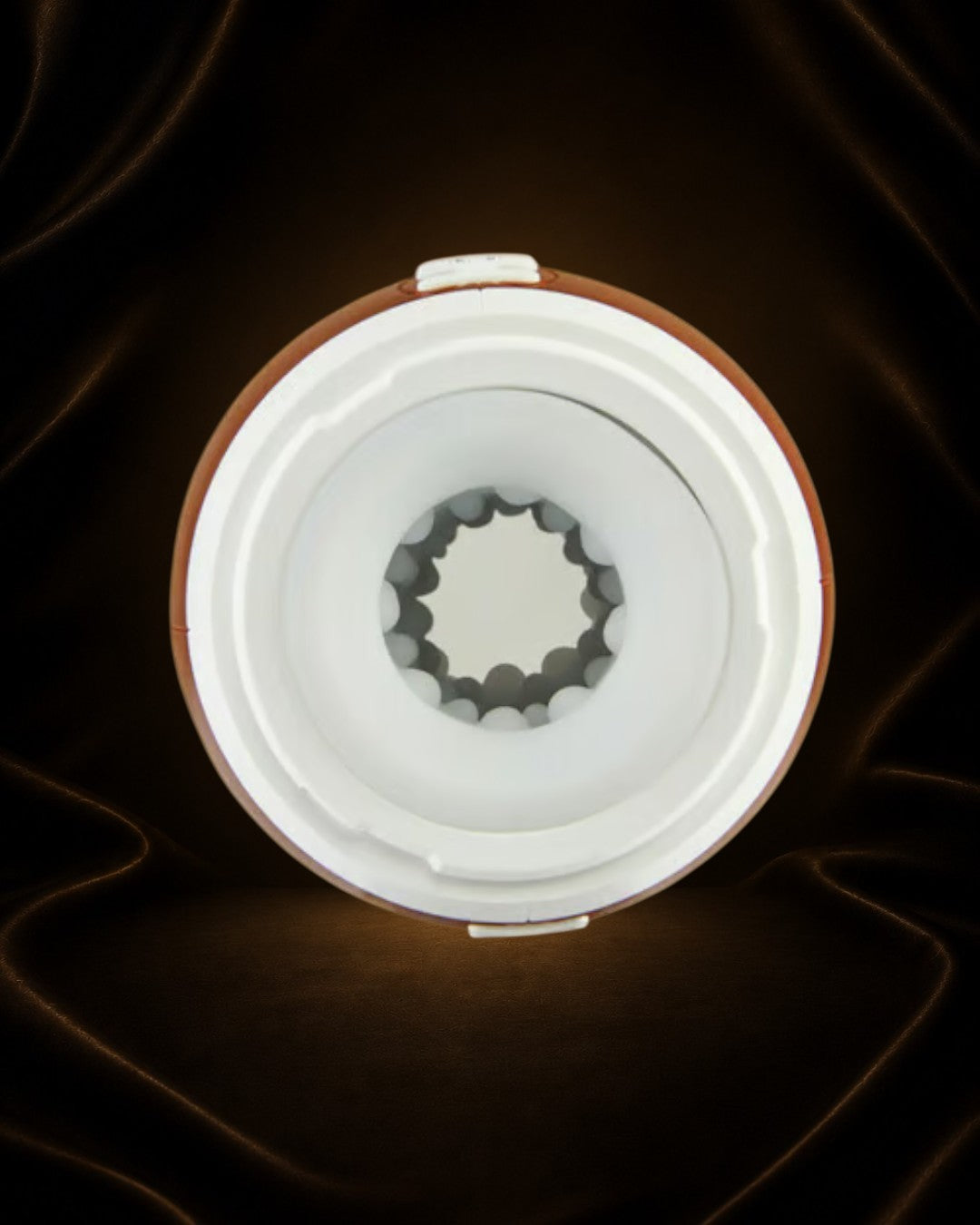 Éxtasis Boutique Masturbador Touchdown de silicona con vibración y textura interna para máxima estimulación.