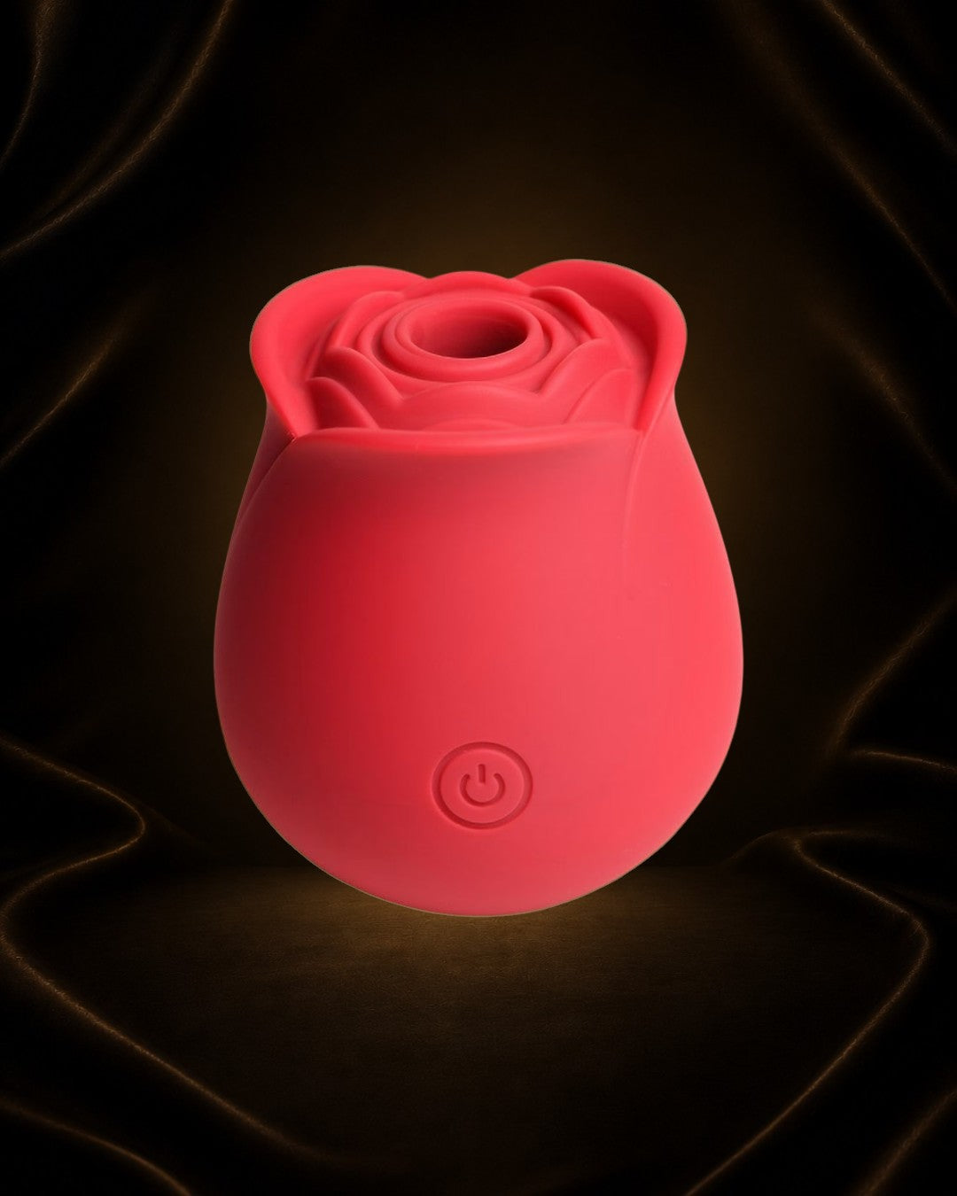 Succionador The Perfect Rose de Éxtasis Boutique en silicona roja, con 3 intensidades y 7 patrones de succión. Diseño de rosa.