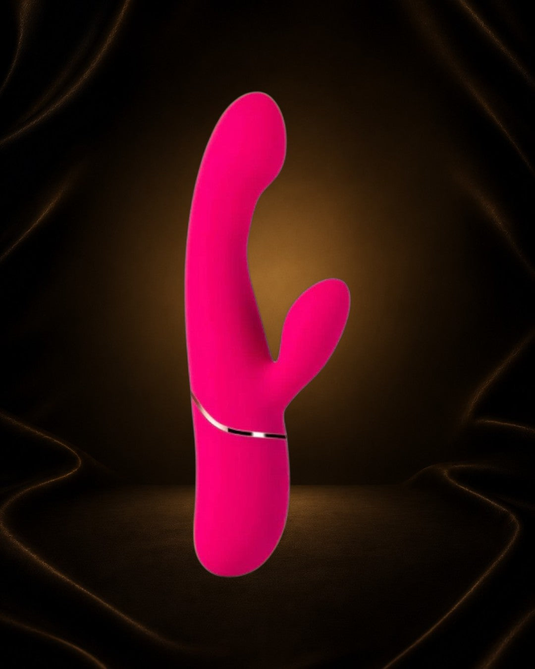 Vibrador Elda de Éxtasis Boutique en color fucsia, con diseño ergonómico para estimulación G y clitoriana.