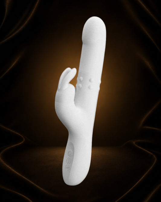 Vibrador blanco de silicona Éxtasis Boutique Reese con 12 velocidades y 4 modos de rotación.