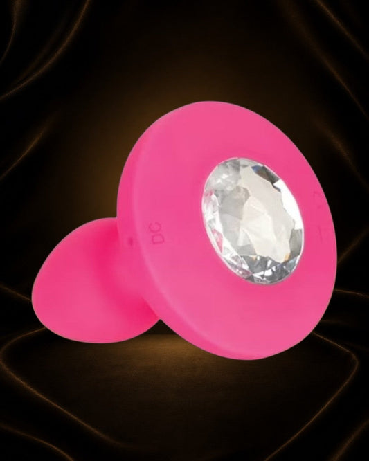Vibrador rosa de silicona Éxtasis Boutique con gema brillante, 10 velocidades, recargable por USB y bloqueo de viaje.